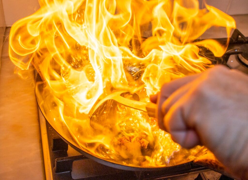 Flames jumping from a Wok