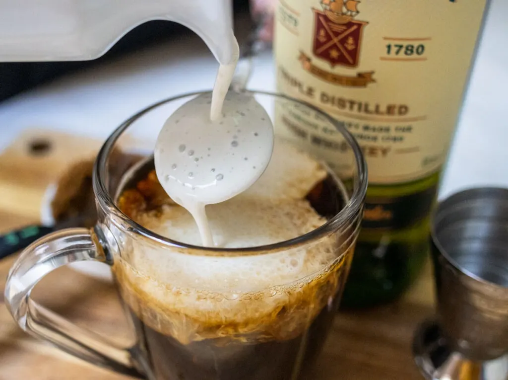 Pouring Cream into Irish Coffee