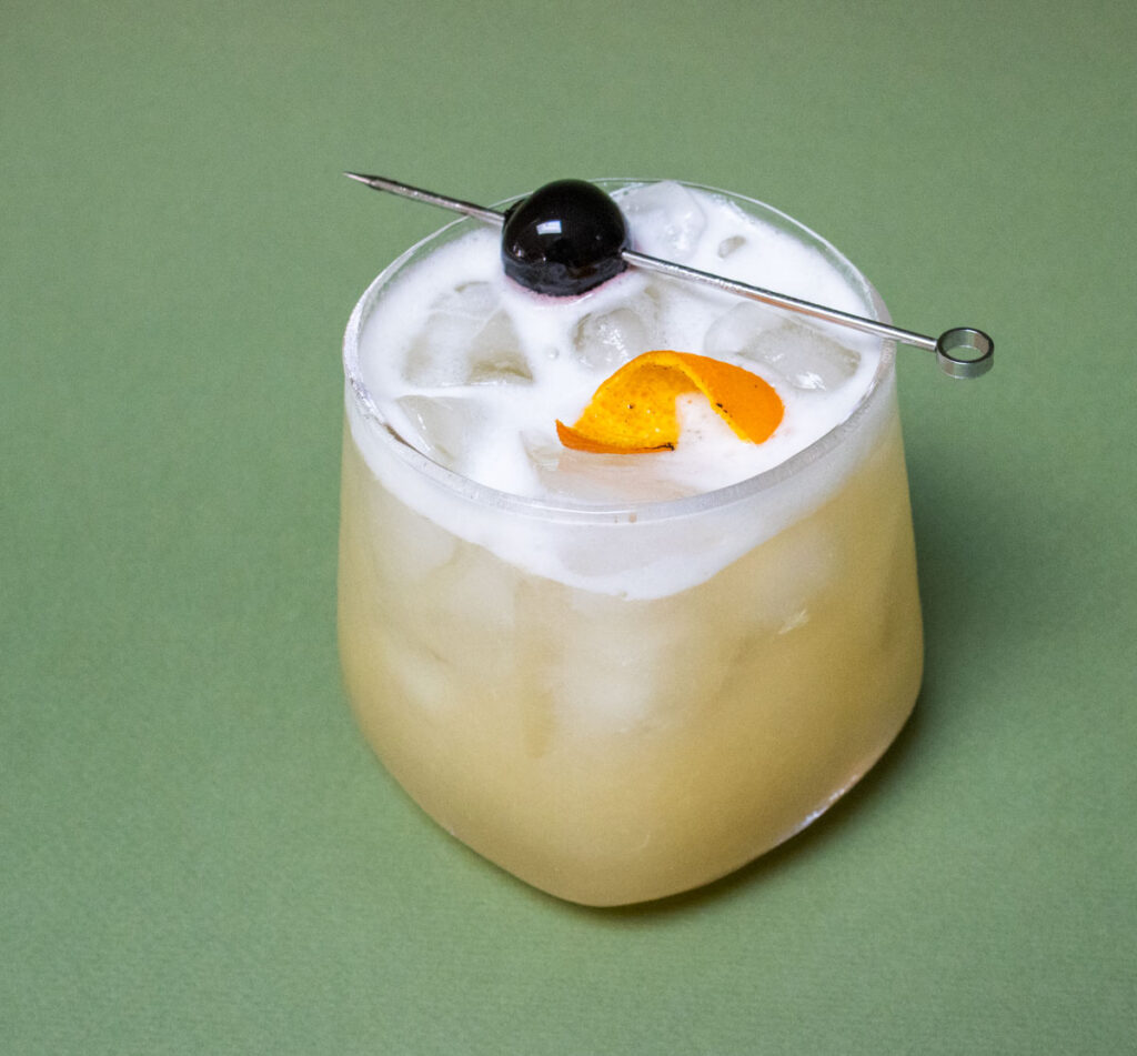 Whiskey Sour with Green Background