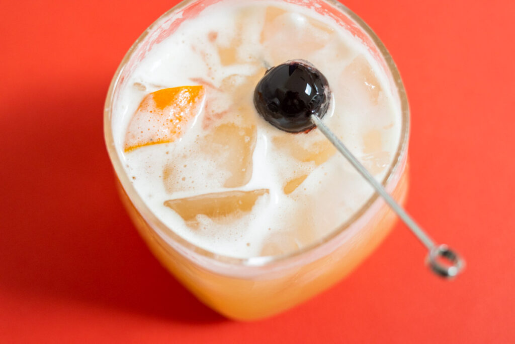 Whiskey Sour with Red Background from Above