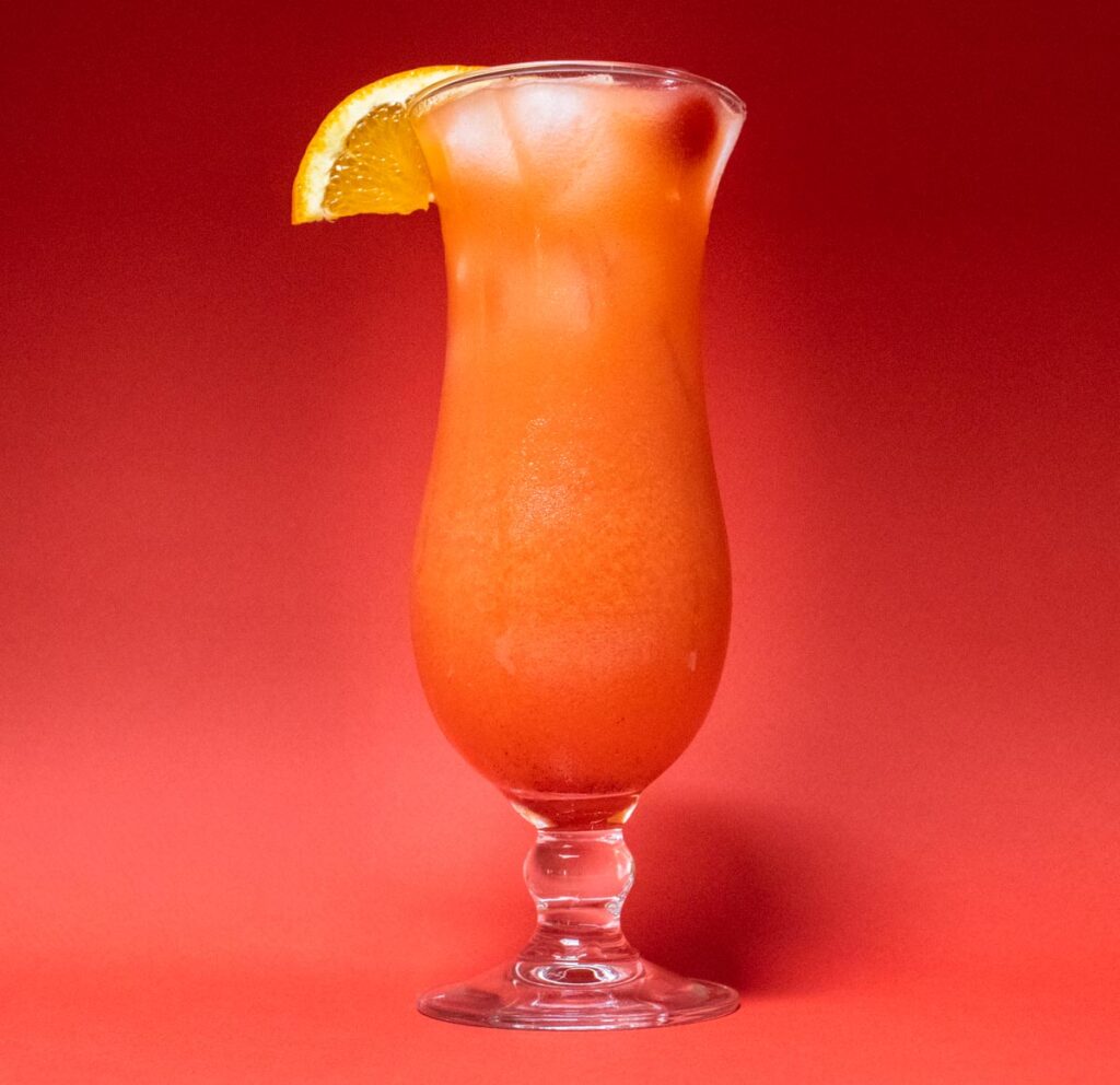 Hurricane Cocktail with Red Background