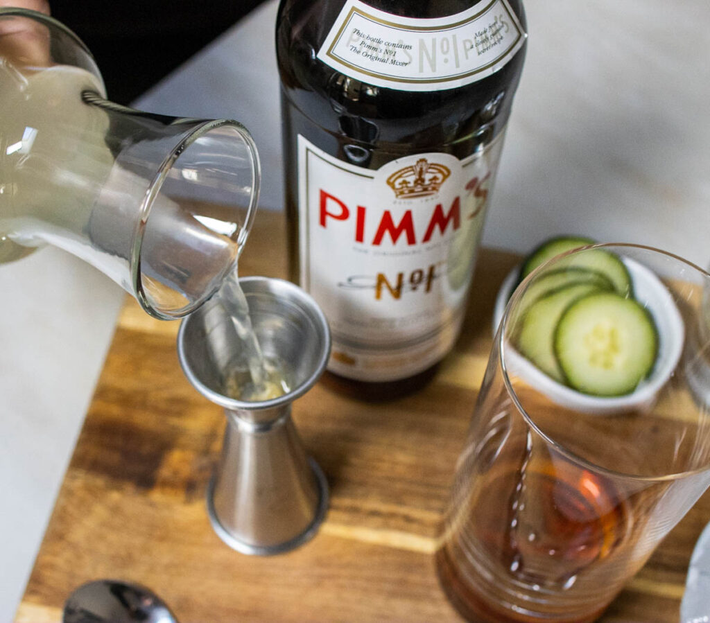 Measuring Lemonade for Pimms Cup Cocktail