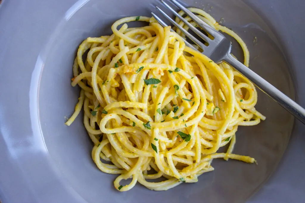 Overhead shot of Spaghetti alla Bottarga with a fork