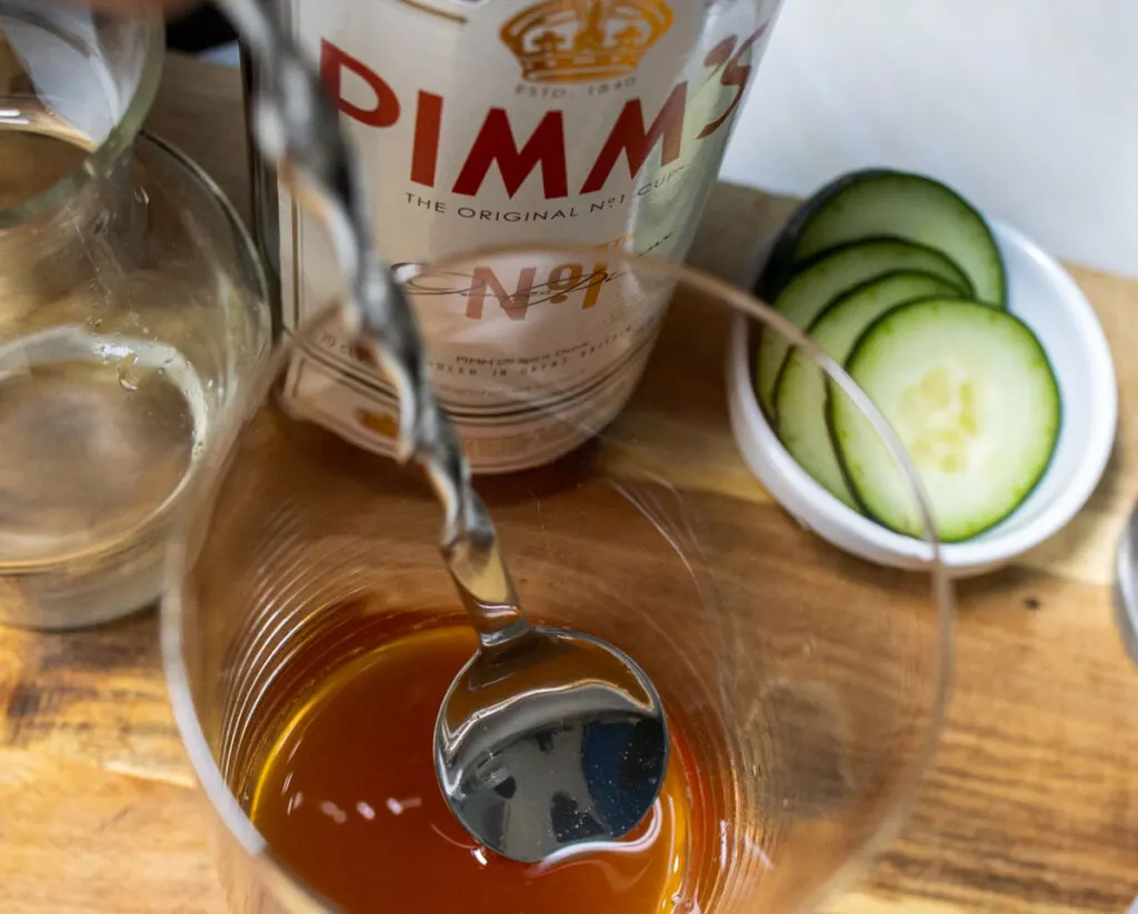 Stirring Pimms Cup Cocktail