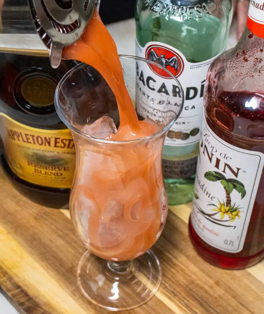 Straining a Hurricane Cocktail