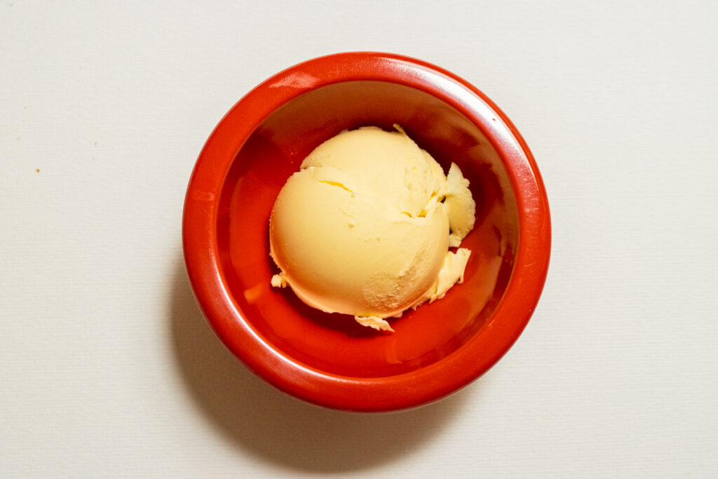 Butter in a small red prep bowl