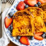Closeup of French toast with strawberries and blueberries