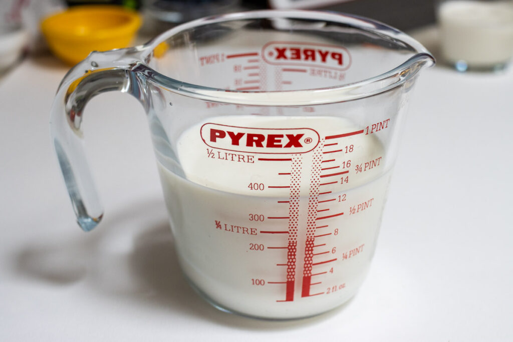 Milk in a measuring cup