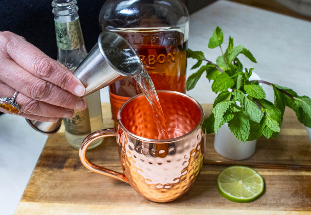 Pouring Ginger Beer into Kentucky Mule
