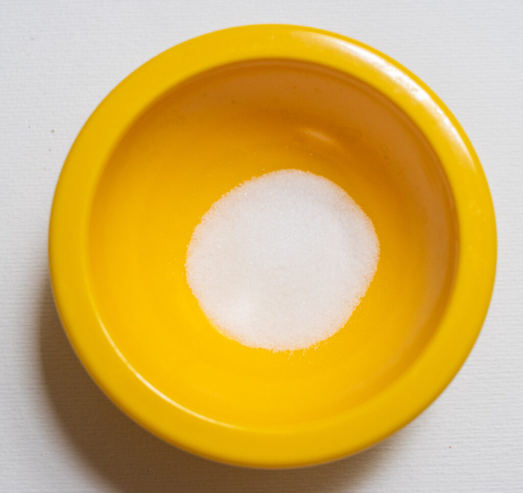 Salt in a yellow bowl
