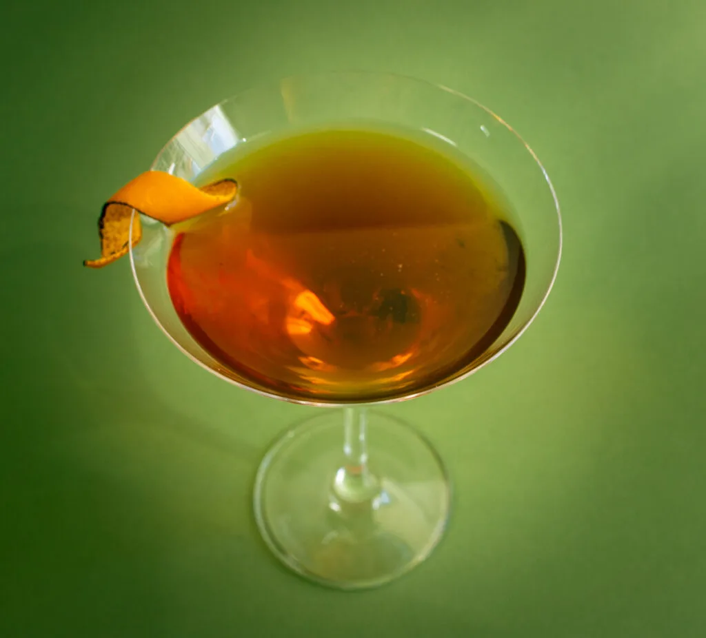 Tipperary Cocktail with Green Background from Above