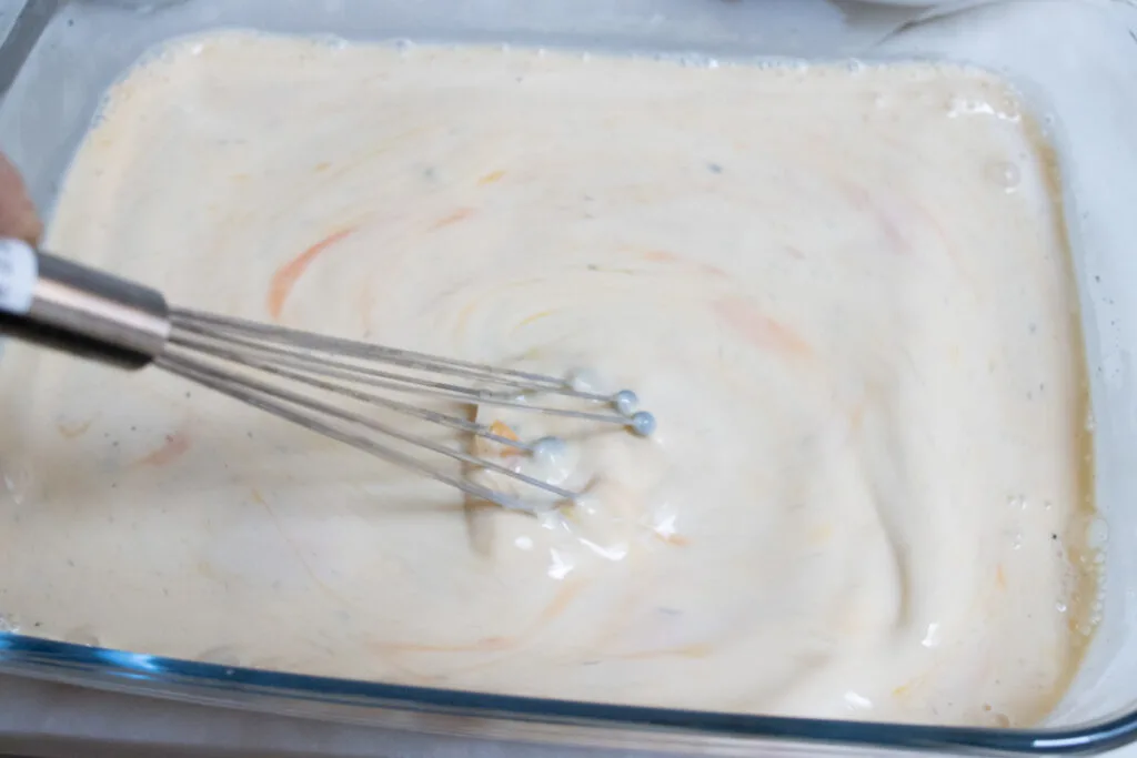 Whisking milk egg mixture for French toast