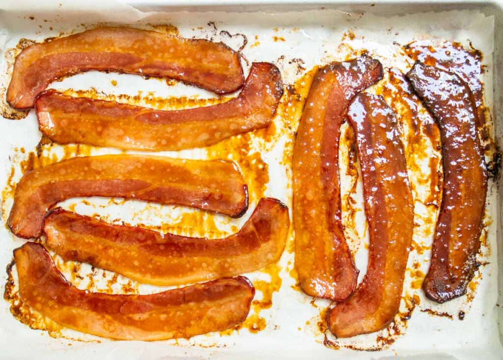 Maple bacon with brown sugar on a parchment sheet