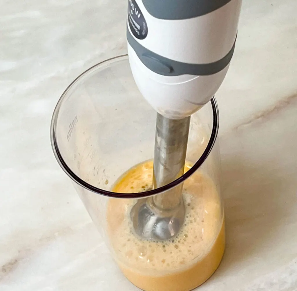 Whipping Orange Juice with a Hand Mixer