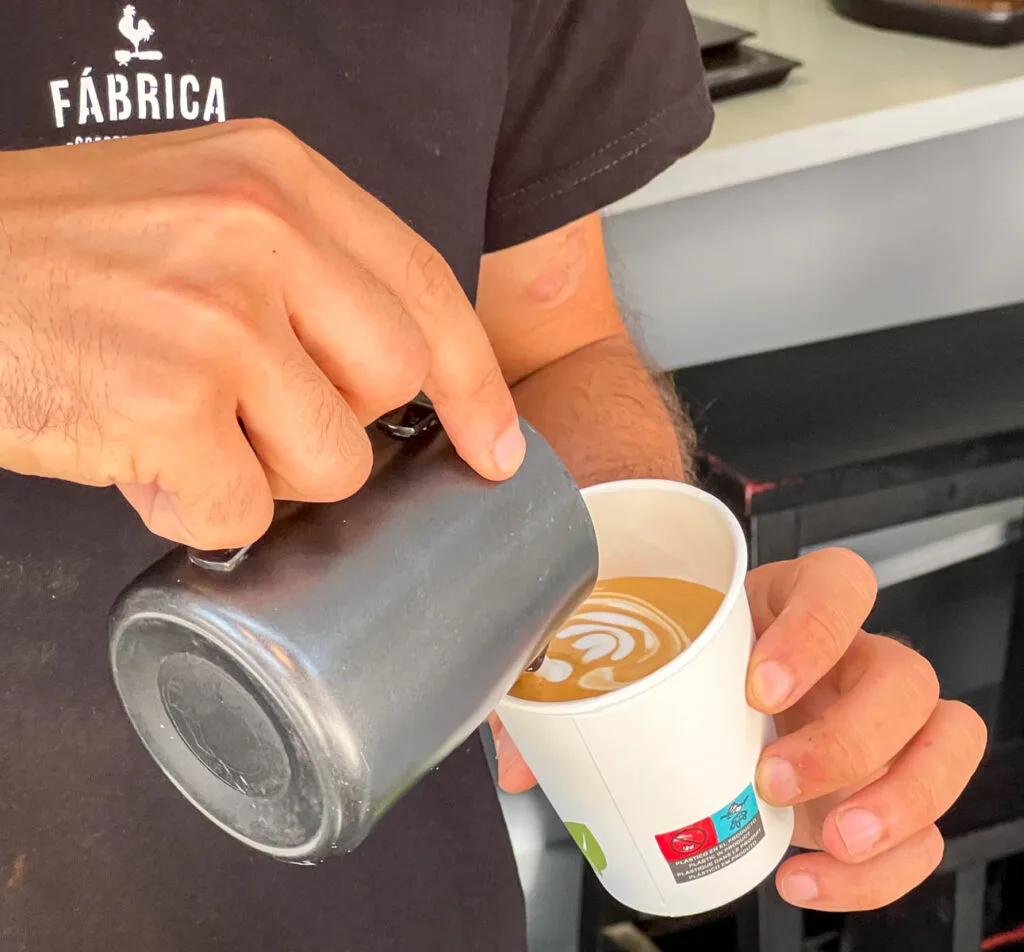 Crafting a Flat White at at Fabrica in Porto