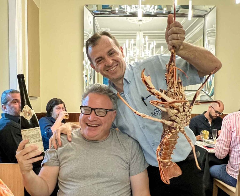Daryl with Server and Rock Lobster at Ramiro in Lisbon