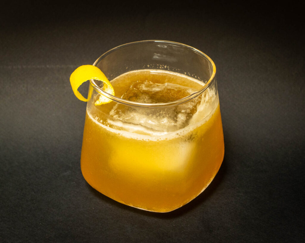 Gold Rush Cocktail from Above with Black Background