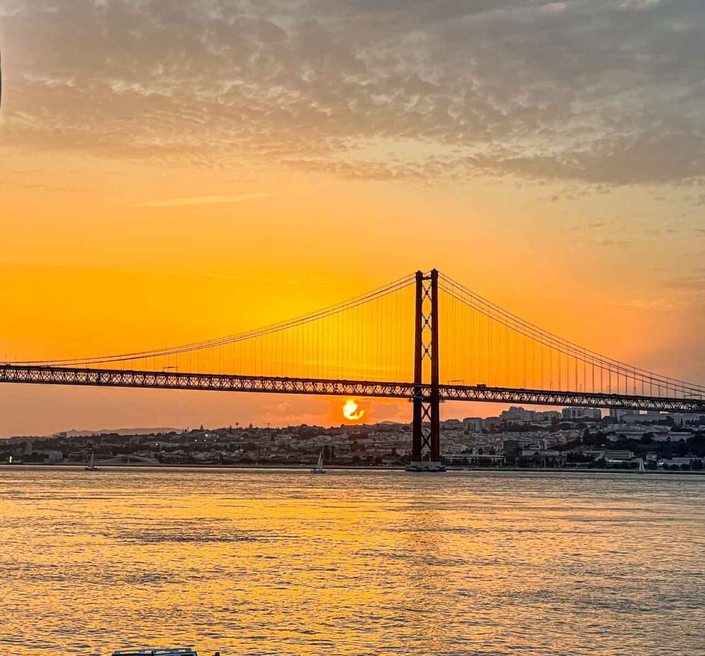 View of April 25 Bridge from Ponto Final in Lisbon