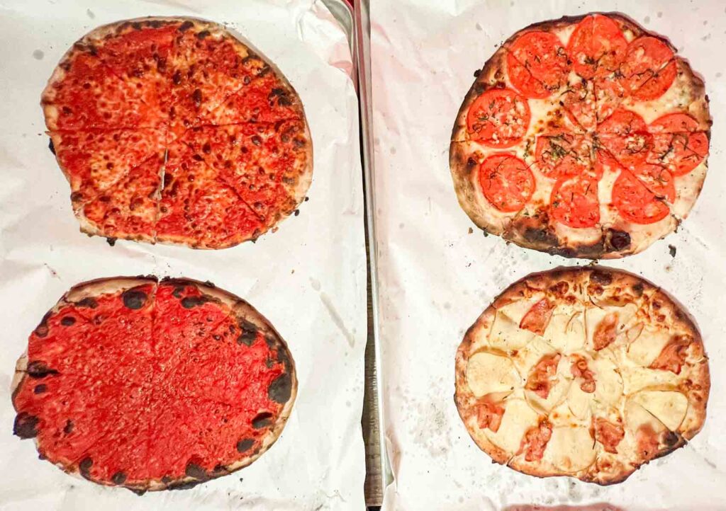 Birdseye of Four Pizzas at Sallys Apizza in New Haven