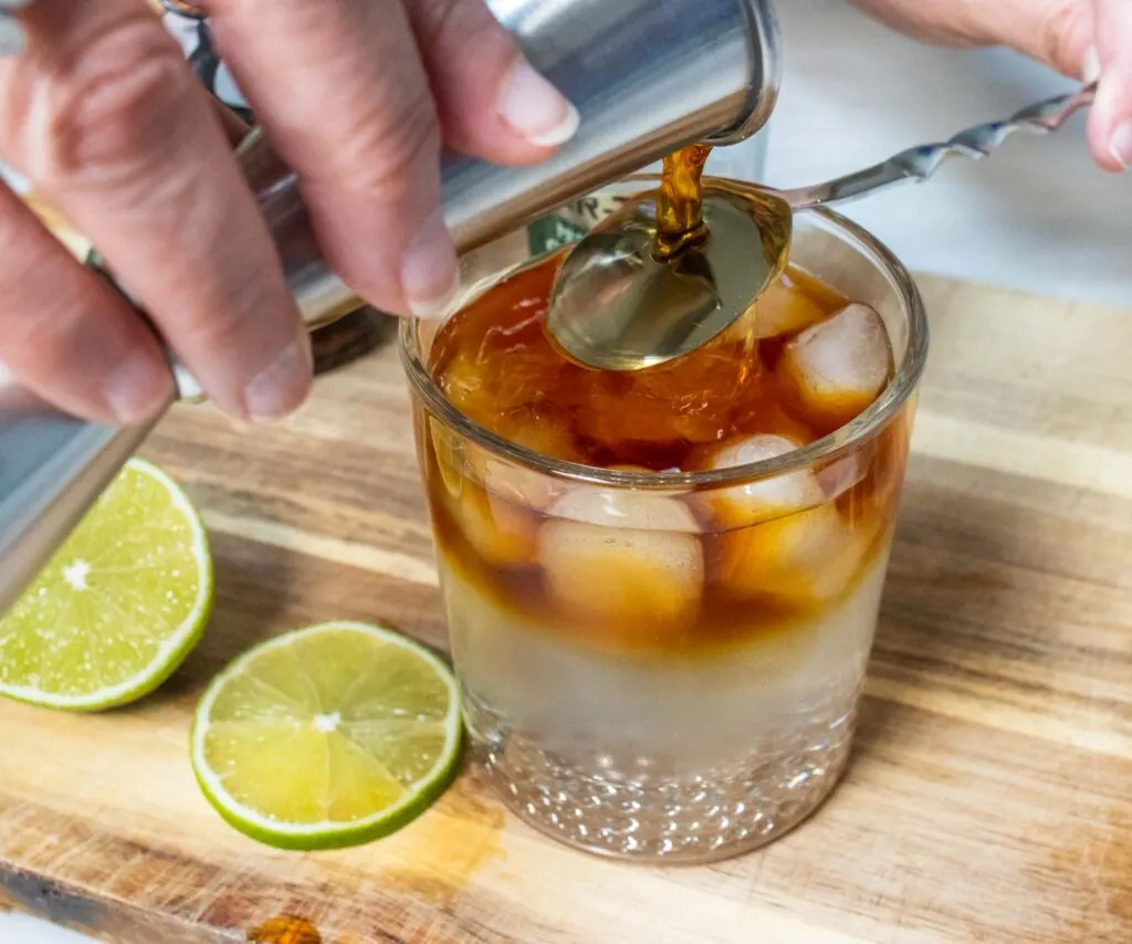 Floating Rum into Dark and Stormy Cocktail