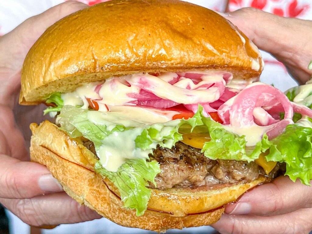 Fuku Burger in Hands at Fuku Burger in Las Vegas