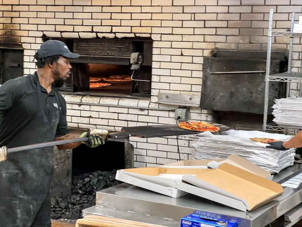 Loading a Pizza in the Oven at Frank Pepe in New Haven