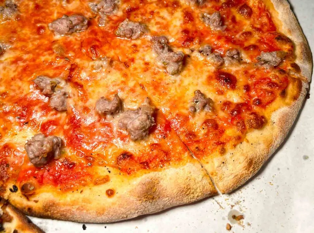 Red Pie with Mozzarella and Sausage at Bar in New Haven