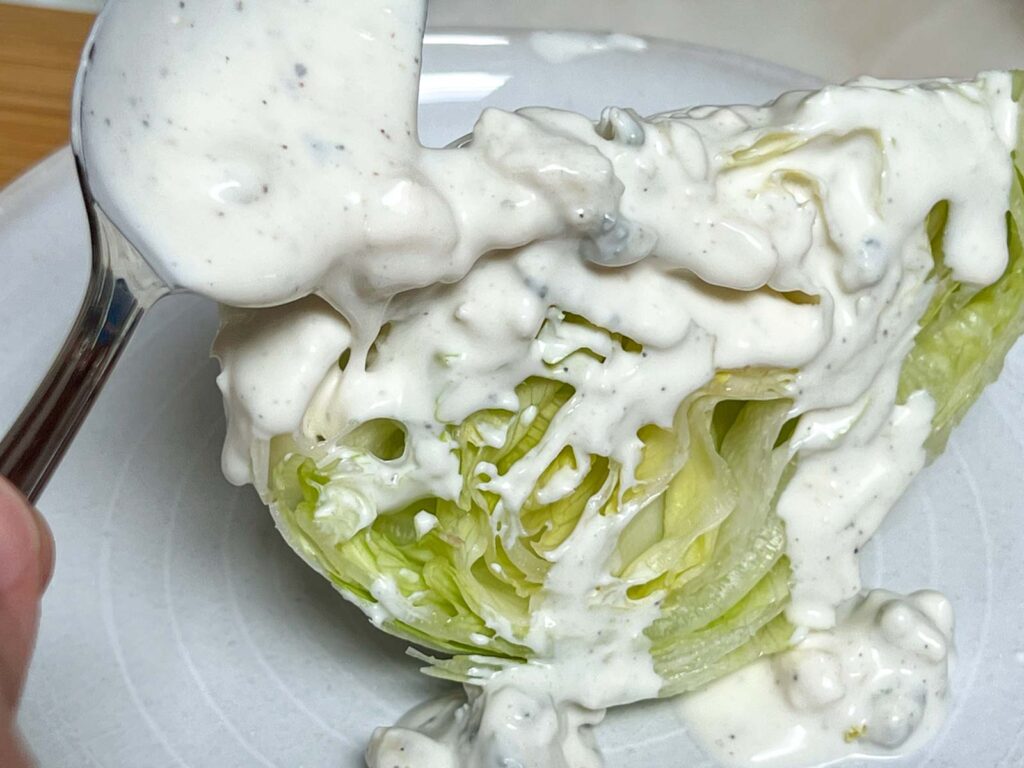 Dressing a Wedge Salad with Blue Cheese Dressing