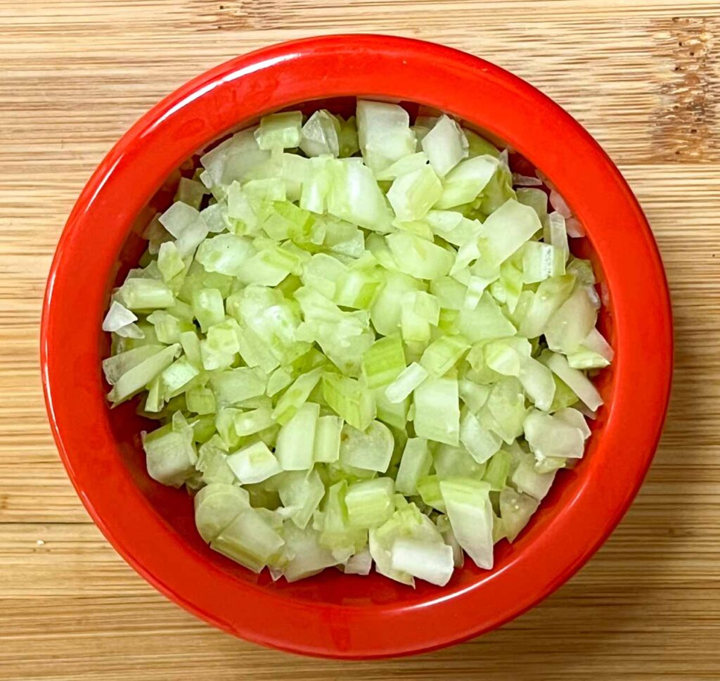 Diced Cucumber in a red prep bowl