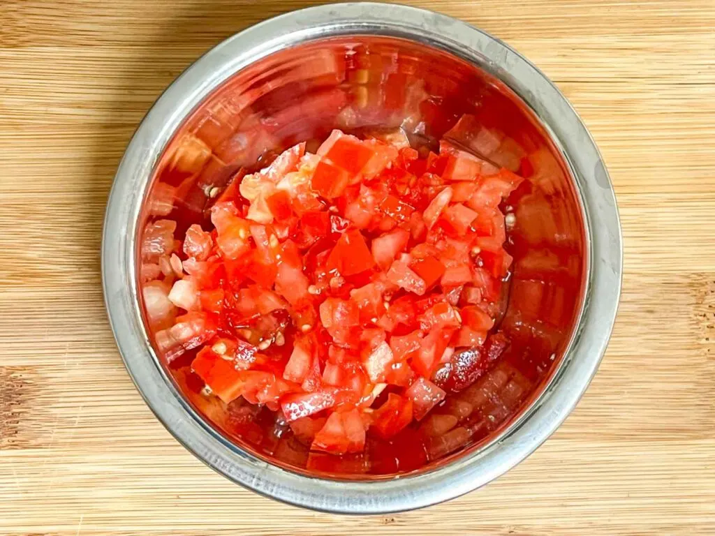 Diced Tomato in a silver prep bowl