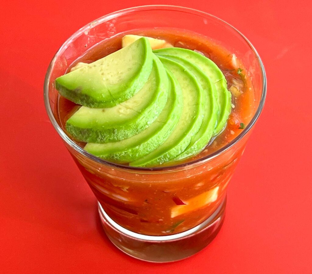 Mexican Shrimp Cocktail on a Red Background
