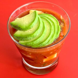 Mexican Shrimp Cocktail on a Red Background