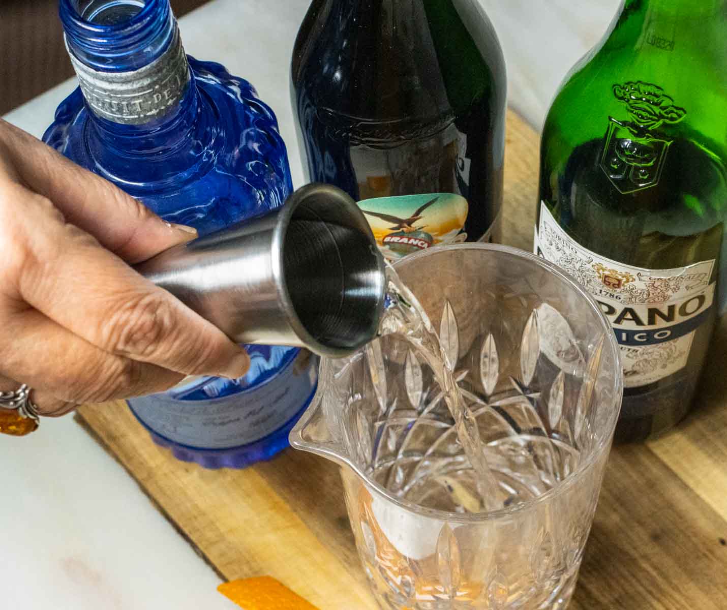 Pouring Gin into a Hanky Panky Cocktail
