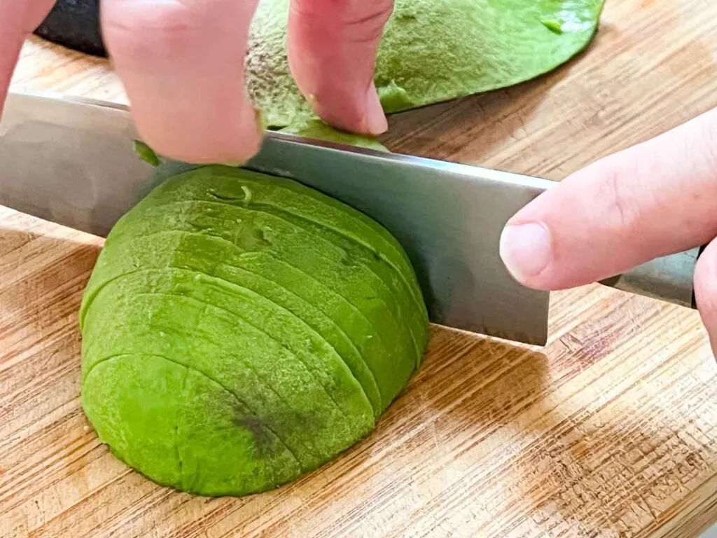 Slicing an Avocado for a Mexican Cocktail Garnish
