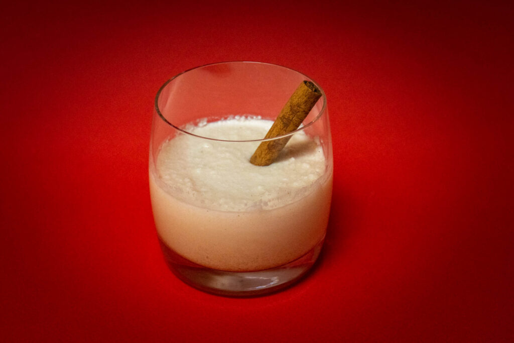 Coquito with Red Background