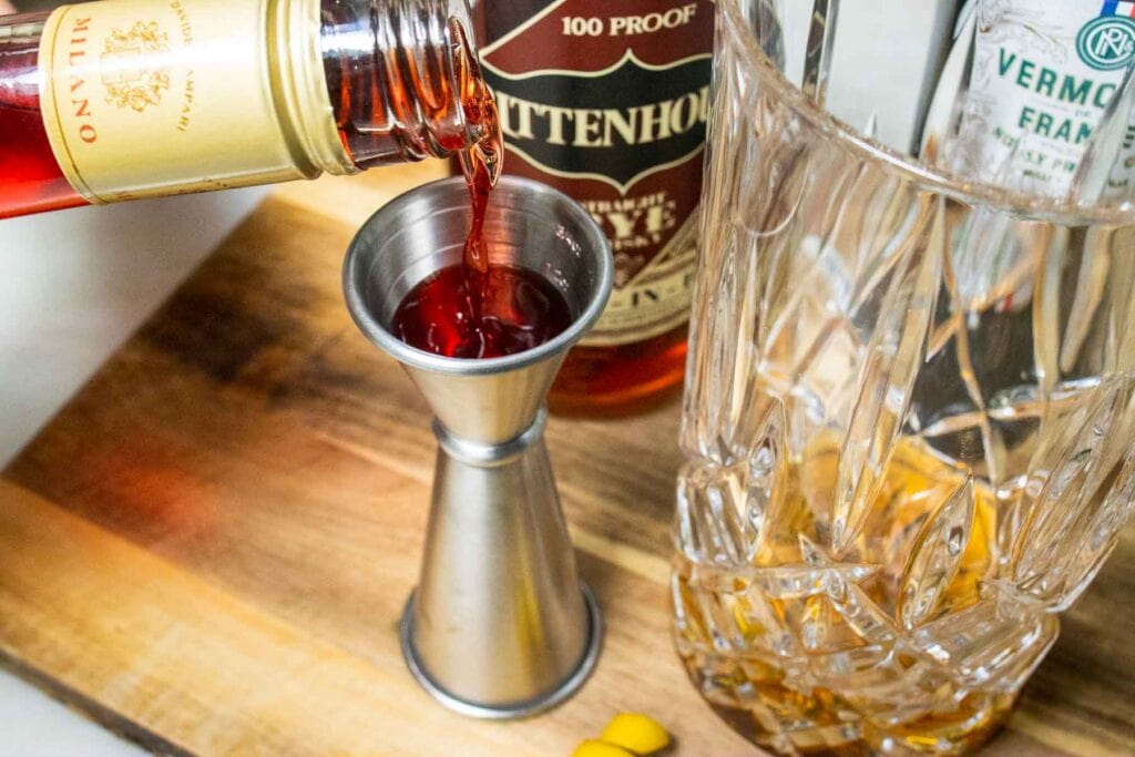 Measuring Campari for an Old Pal Cocktail