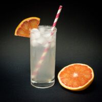 Paloma Cocktail with Grapefruit and Black Background