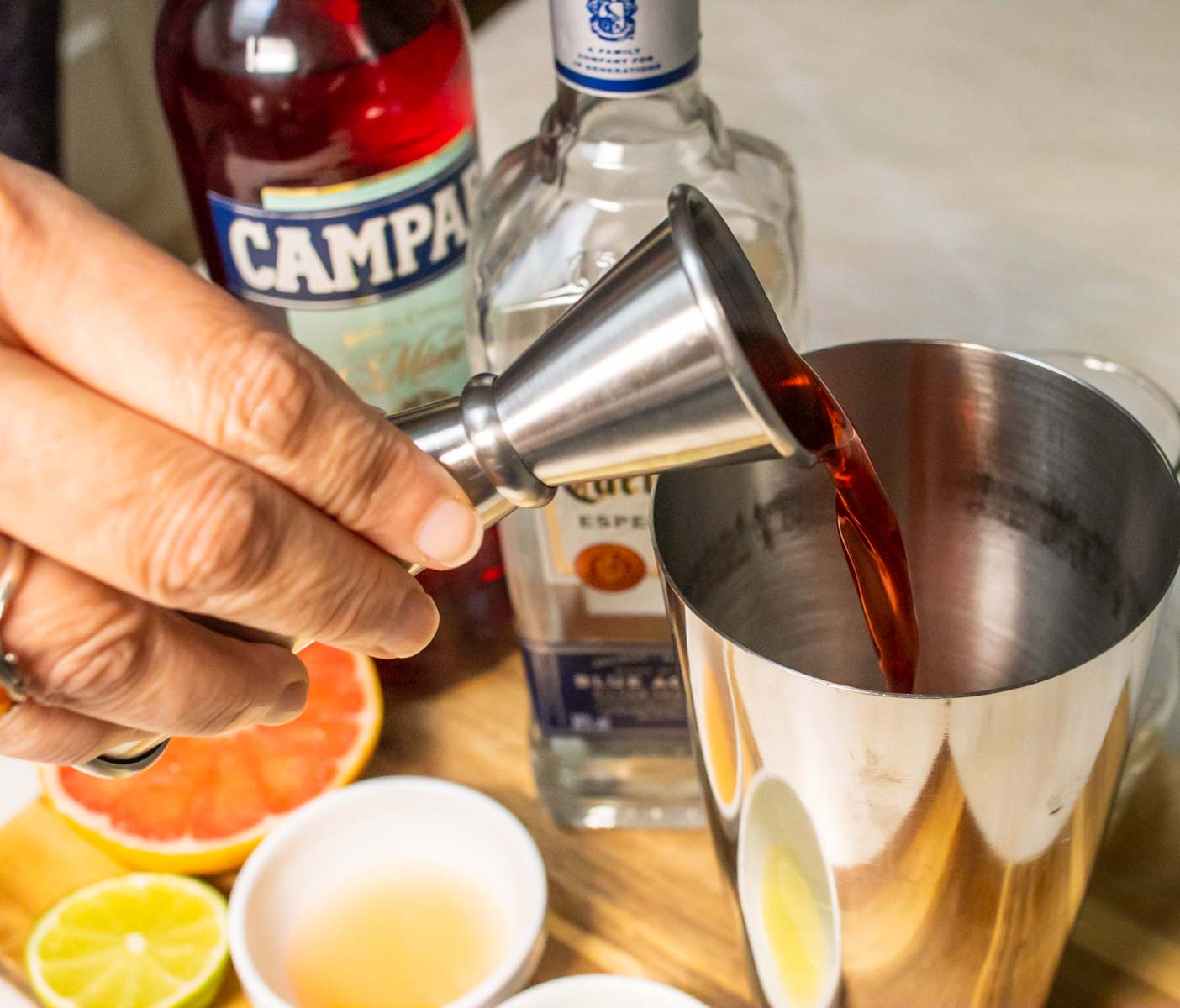 Pouring Campari for a Siesta Cocktail