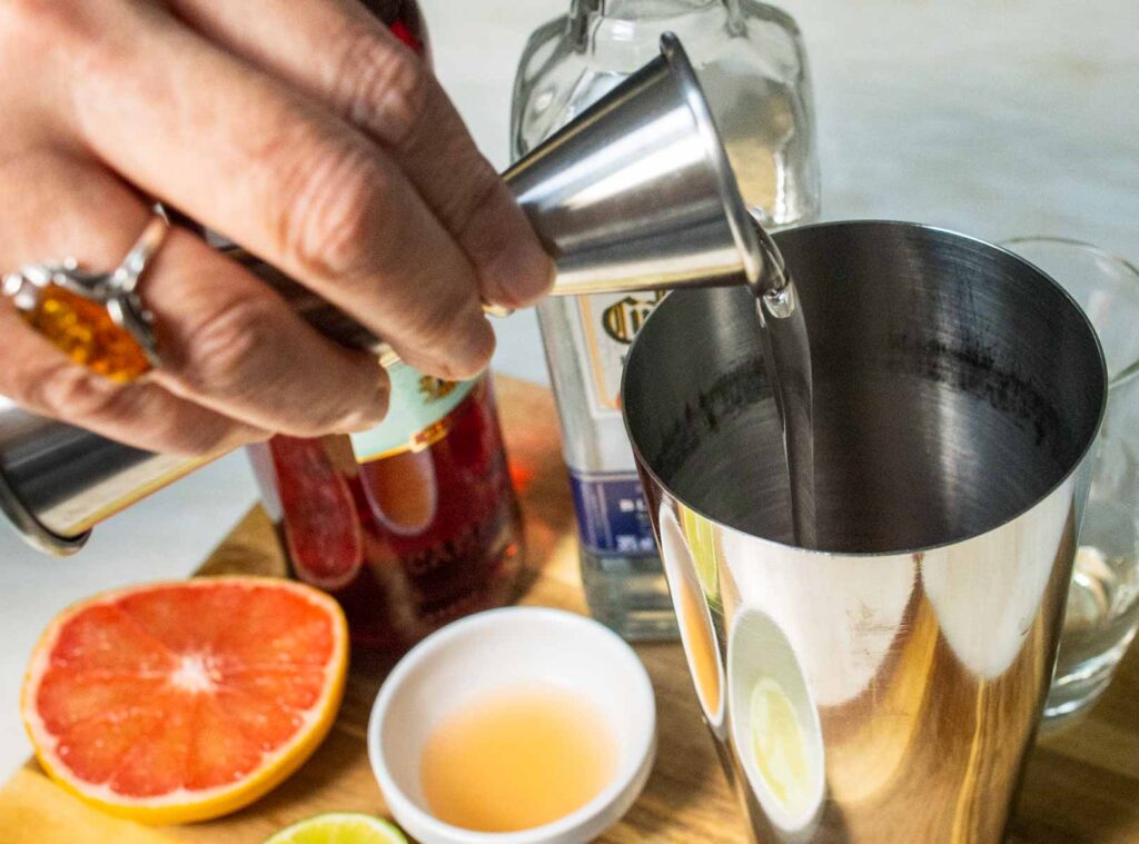 Pouring Simple Syrup into a Siesta Cocktail