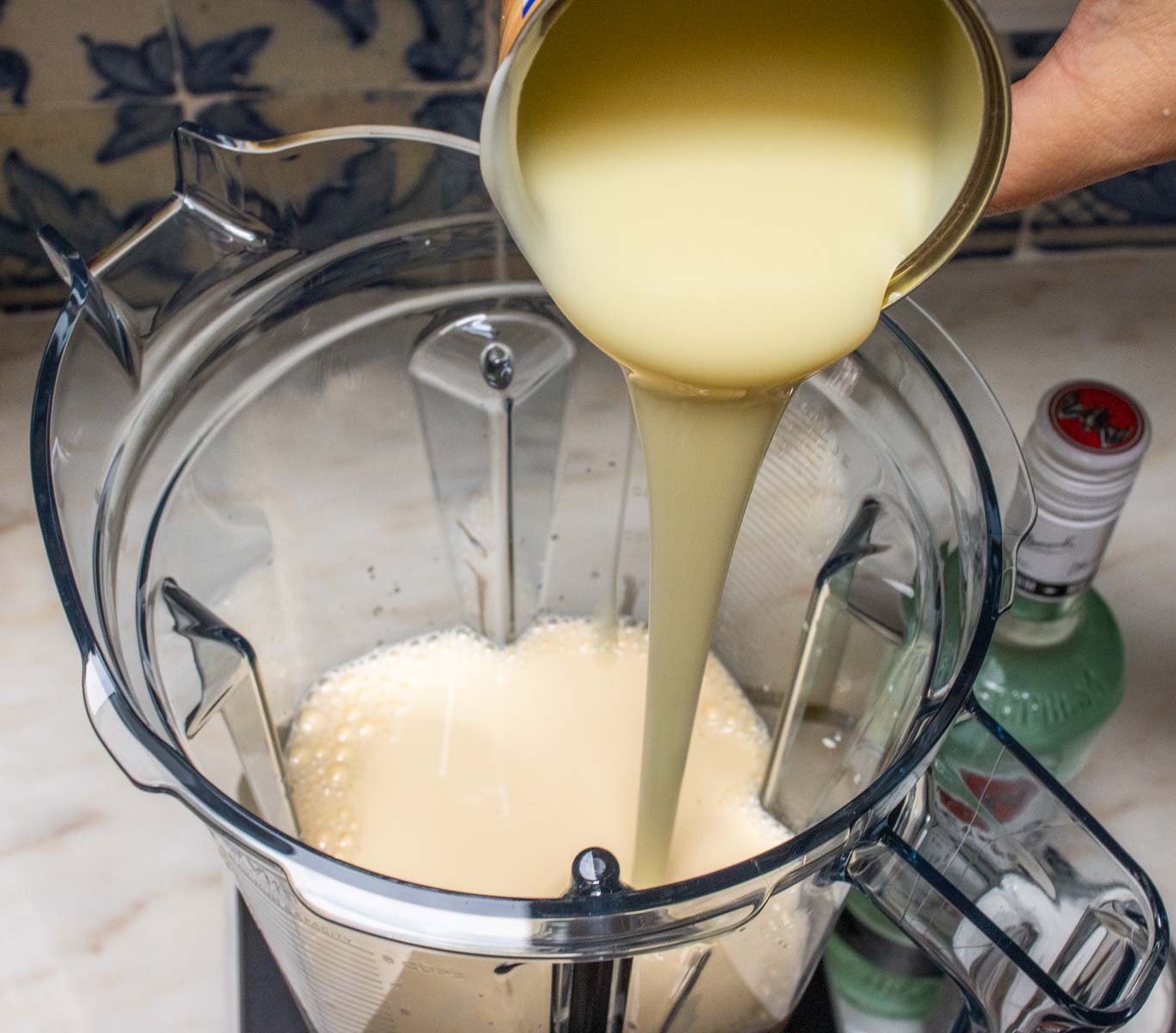 Pouring Sweetened Condensed Milk into Blender