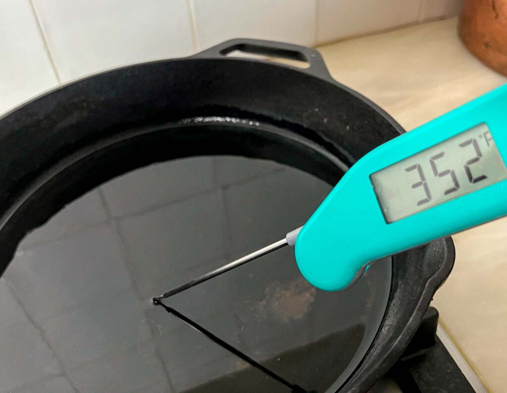measuring the oil temperature before frying