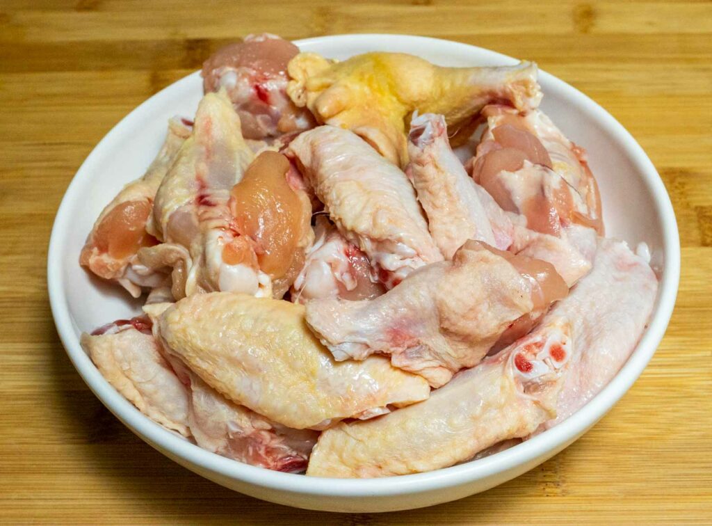 Raw separated wings in a bowl
