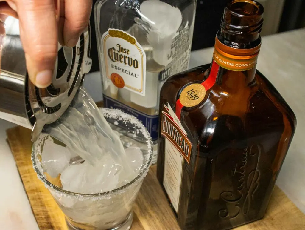 Straining Classic Margarita Into a Glass