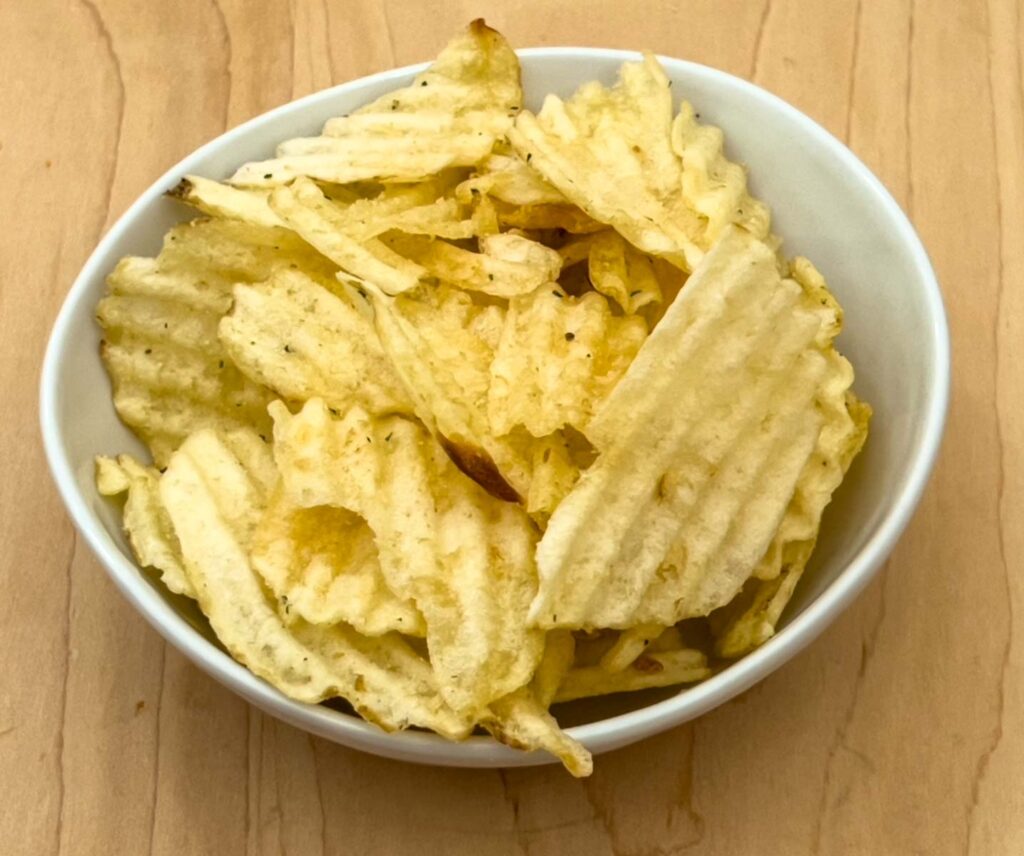 Herrs Dill Pickle Chips in White Bowl