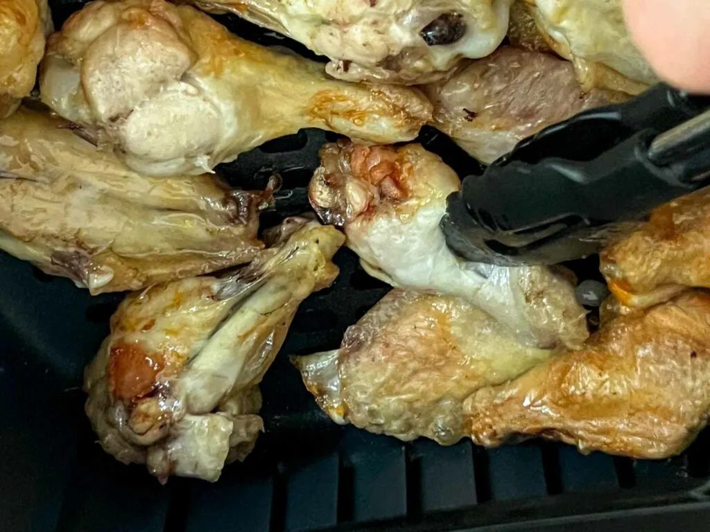 Turning Chicken Wings in the Air Fryer During Cooking