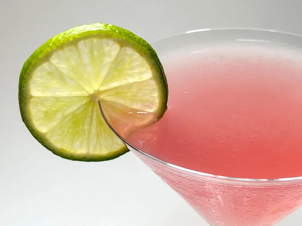 Cosmopolitan Cocktail with Lime Wheel Up Close