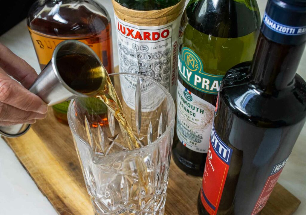 Pouring Liquor into a Mixing Glass