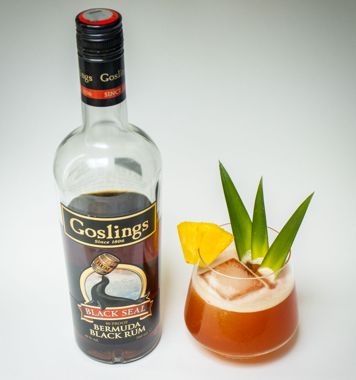 Jungle Bird Cocktail with Rum Bottle