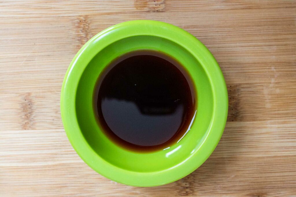 Soy Sauce in a green bowl