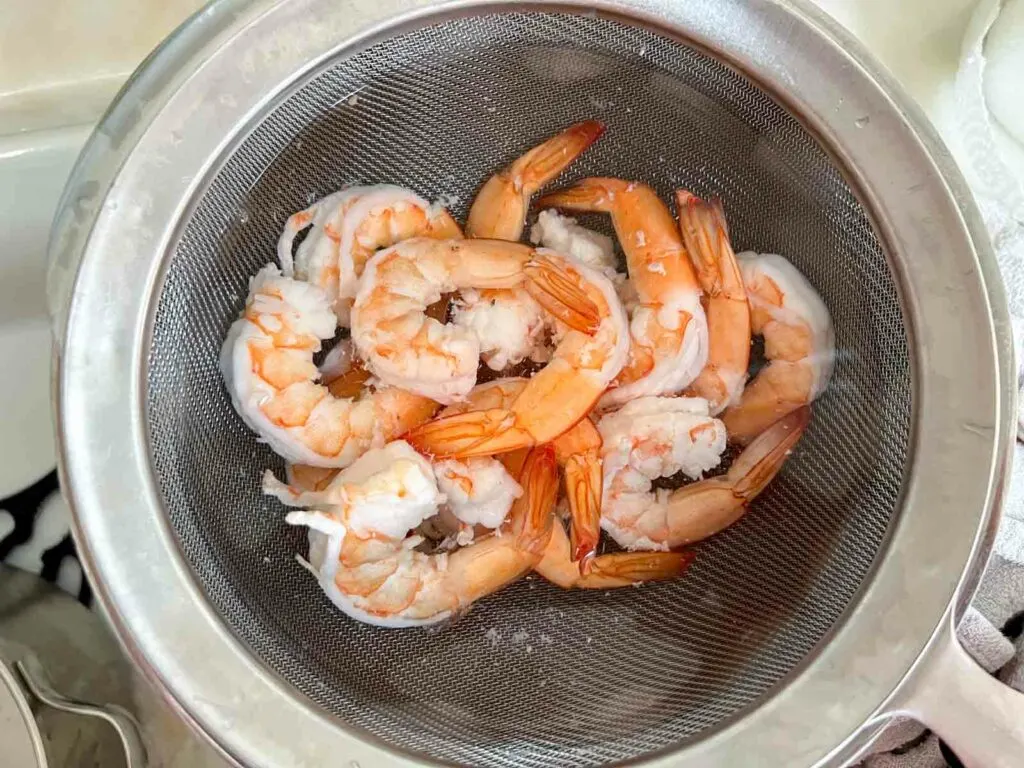 Straining Boiled Shrimp